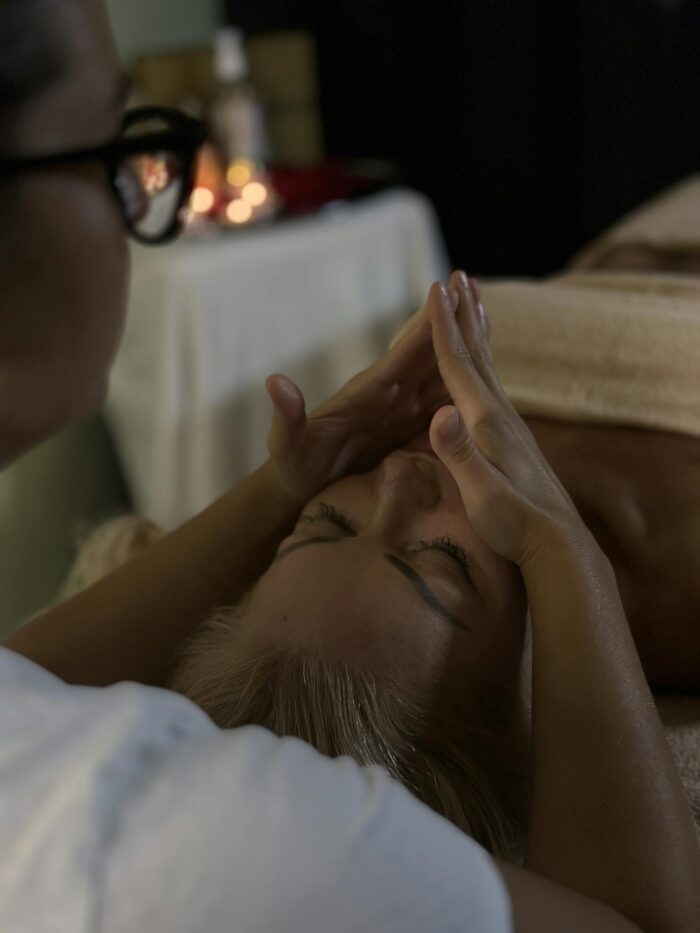 A woman getting a massage in a spa